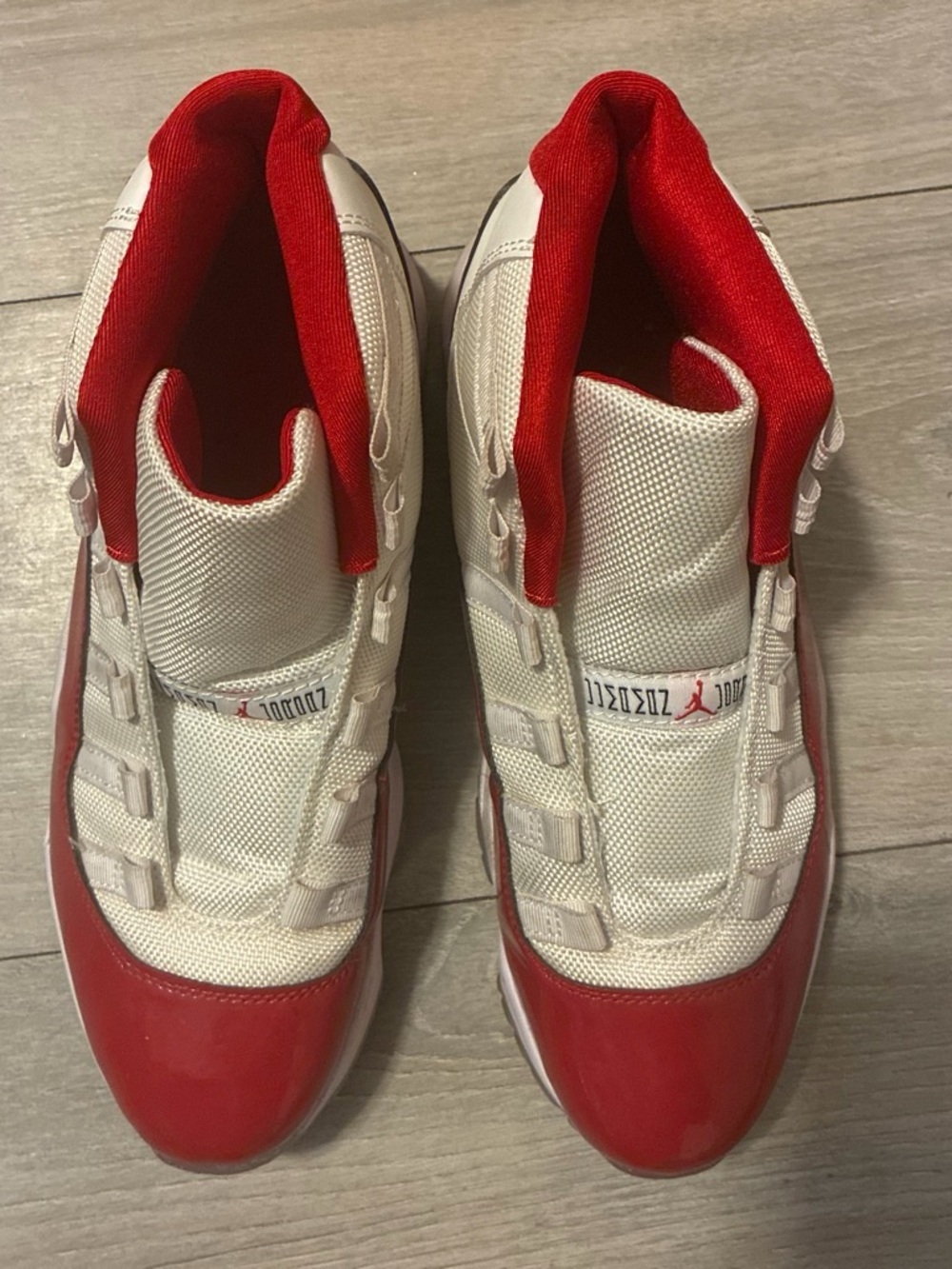 Jordan 11's White & Red Retro Basketball Shoes